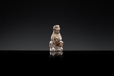 A 'DAOIST OFFICIAL' BROWN-GLAZED POTTERY WHISTLE, JIN DYNASTY