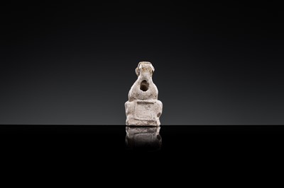 A 'DAOIST OFFICIAL' BROWN-GLAZED POTTERY WHISTLE, JIN DYNASTY