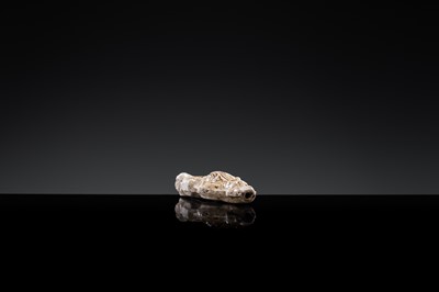 A 'DAOIST OFFICIAL' BROWN-GLAZED POTTERY WHISTLE, JIN DYNASTY