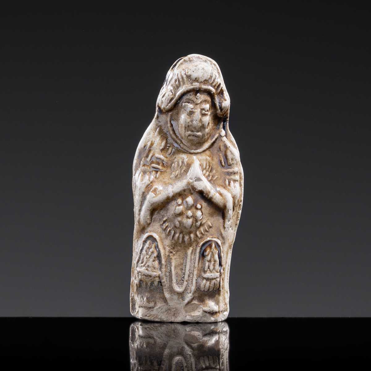 A BROWN GLAZED ‘HEAVENLY GUARDIAN’ STONEWARE WHISTLE, JIN DYNASTY