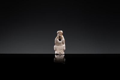 A 'DAOIST OFFICIAL' BROWN-GLAZED POTTERY WHISTLE, JIN DYNASTY