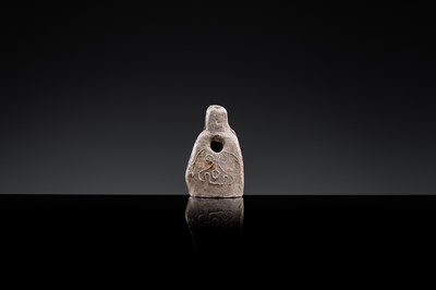 A BROWN-GLAZED POTTERY WHISTLE IN THE FORM OF A DEITY, JIN DYNASTY