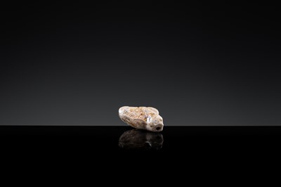 A BROWN-GLAZED POTTERY WHISTLE IN THE FORM OF A DEITY, JIN DYNASTY