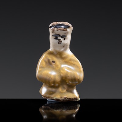 Lot 116 - A RARE POLYCHROME GLAZED CIZHOU WARE CHESS PIECE IN THE FORM OF A MAN, JIN DYNASTY