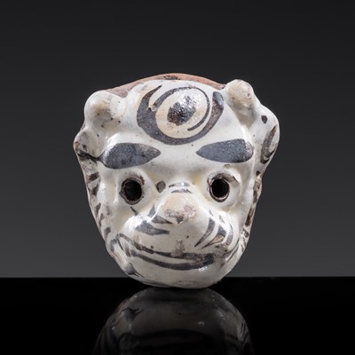 Lot 121 - A CIZHOU SLIP PAINTED ‘TIGER MASK’ WHISTLE, JIN-YUAN DYNASTY