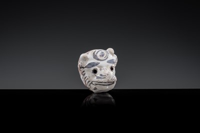 A CIZHOU SLIP PAINTED ‘TIGER MASK’ WHISTLE, JIN-YUAN DYNASTY