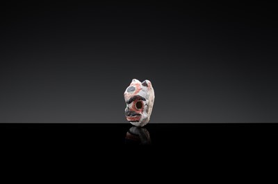 A CIZHOU SLIP PAINTED ‘THEATRE MASK’ WHISTLE, JIN-YUAN DYNASTY