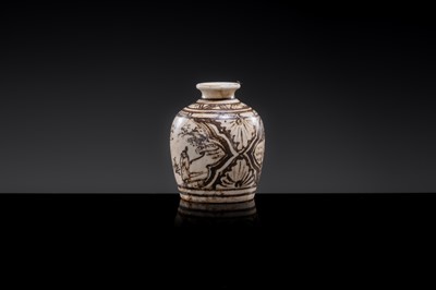 A SMALL CIZHOU SLIP PAINTED ‘CIVIL SERVANT’ JARLET, JIN-YUAN DYNASTY