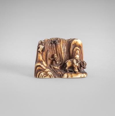 Lot 1584 - A RARE IVORY NETSUKE OF TWO SCHOLARS WITH OX