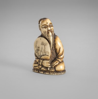 Lot 1697 - AN ANTLER NETSUKE OF A SCHOLAR WITH FAN