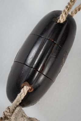 Lot 1431 - A SMALL TWO-CASE LACQUER INRO DEPICTING A SHISHI