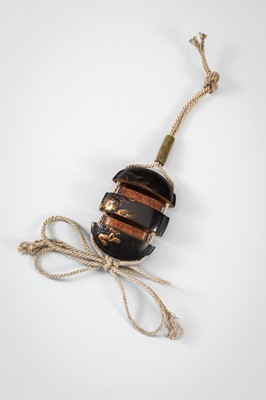 Lot 1431 - A SMALL TWO-CASE LACQUER INRO DEPICTING A SHISHI