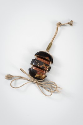 Lot 1431 - A SMALL TWO-CASE LACQUER INRO DEPICTING A SHISHI