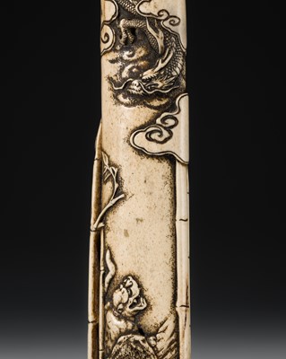 Lot 55 - AN ANTLER KISERUZUTSU (PIPE CASE) WITH DRAGON AND TIGER