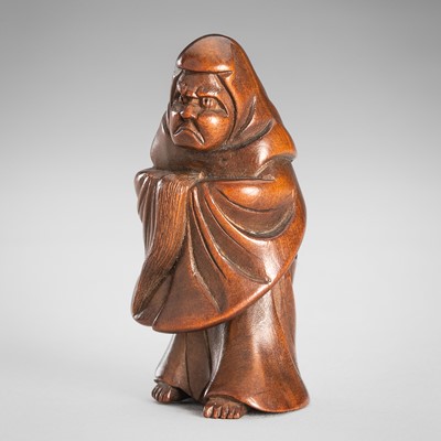 Lot 1549 - A BOXWOOD NETSUKE OF DARUMA
