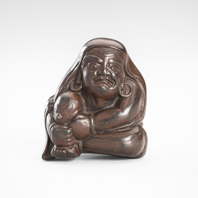 Lot 1777 - A GLAZED CERAMIC NETSUKE OF DARUMA