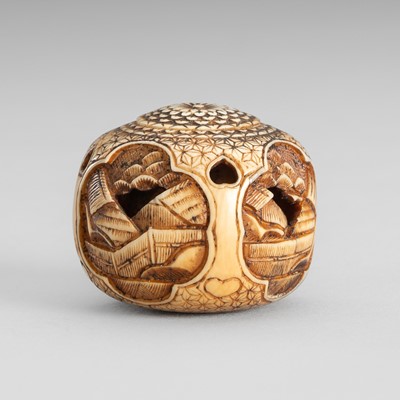 Lot 1508 - A FINE IVORY MANJU NETSUKE DEPICTING VILLAGE VIEWS