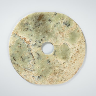 Lot 924 - A LARGE NEOLITHIC CHINESE LIGHT GREEN JADE BI DISC