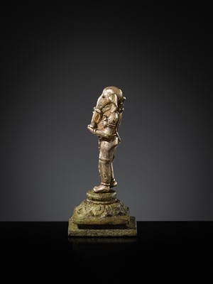 Lot 265 - A SILVER AND COPPER-ALLOY FIGURE OF GANESHA, CENTRAL JAVA, INDONESIA, 13TH CENTURY