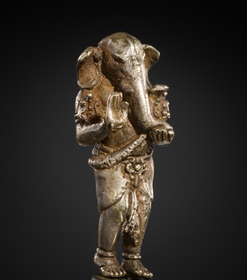 Lot 265 - A SILVER AND COPPER-ALLOY FIGURE OF GANESHA, CENTRAL JAVA, INDONESIA, 13TH CENTURY