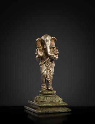 Lot 265 - A SILVER AND COPPER-ALLOY FIGURE OF GANESHA, CENTRAL JAVA, INDONESIA, 13TH CENTURY