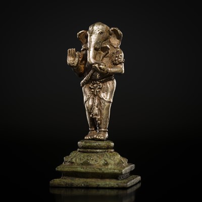 Lot 265 - A SILVER AND COPPER-ALLOY FIGURE OF GANESHA, CENTRAL JAVA, INDONESIA, 13TH CENTURY