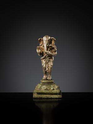 Lot 265 - A SILVER AND COPPER-ALLOY FIGURE OF GANESHA, CENTRAL JAVA, INDONESIA, 13TH CENTURY