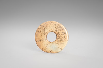 Lot 920 - A JADE CLOUD MASK AND BI DISK, HONGSHAN CULTURE OR LATER