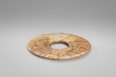 Lot 920 - A JADE CLOUD MASK AND BI DISK, HONGSHAN CULTURE OR LATER