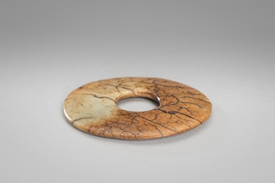Lot 920 - A JADE CLOUD MASK AND BI DISK, HONGSHAN CULTURE OR LATER