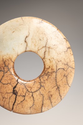 Lot 920 - A JADE CLOUD MASK AND BI DISK, HONGSHAN CULTURE OR LATER
