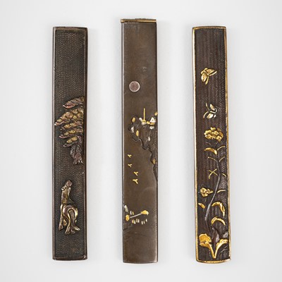 Lot 1251 - A GROUP OF THREE MIXED-METAL KOZUKA