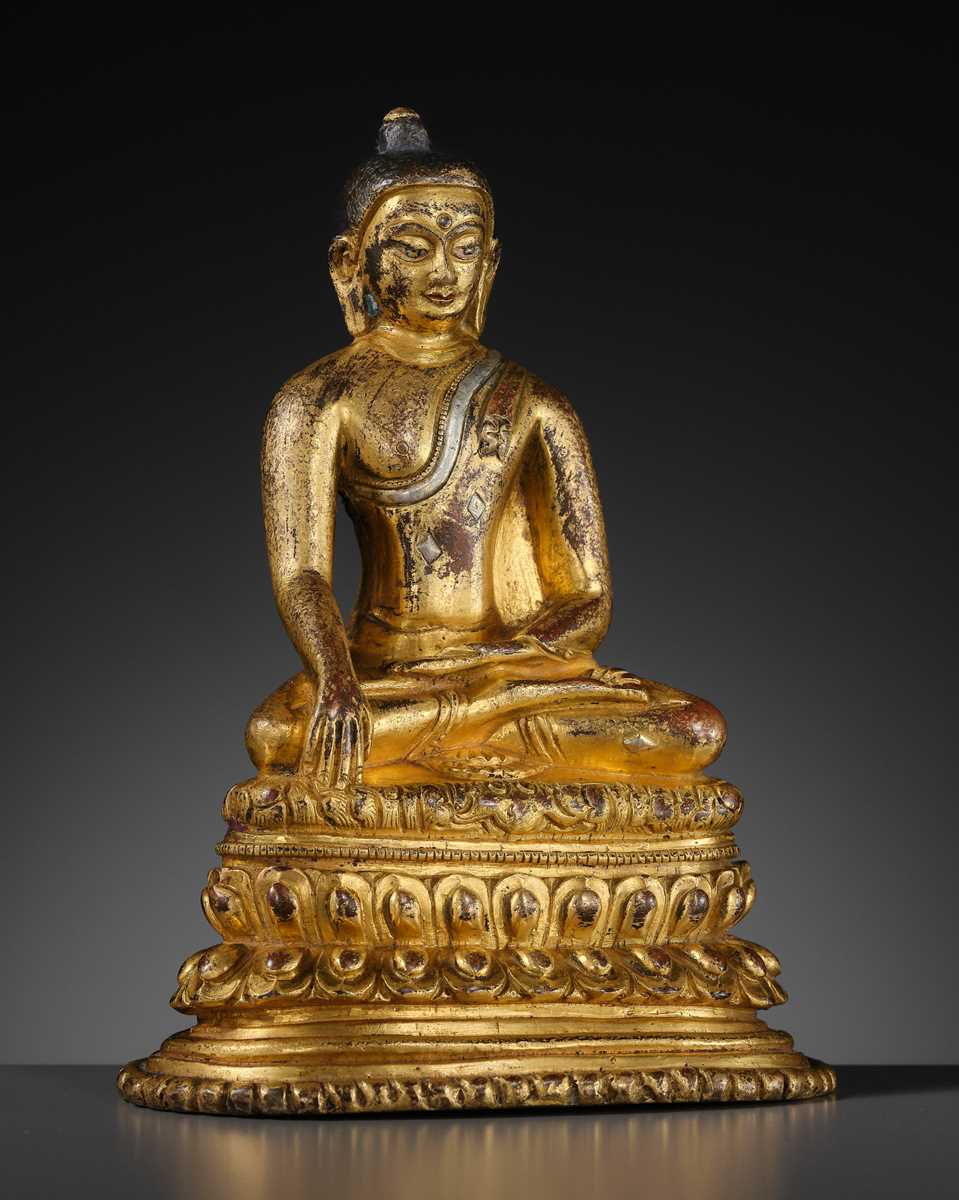 Lot 23 - A SILVER-INLAID GILT COPPER-ALLOY FIGURE OF BUDDHA SHAKYAMUNI