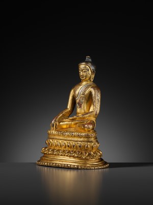 Lot 23 - A SILVER-INLAID GILT COPPER-ALLOY FIGURE OF BUDDHA SHAKYAMUNI