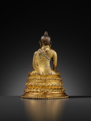 Lot 23 - A SILVER-INLAID GILT COPPER-ALLOY FIGURE OF BUDDHA SHAKYAMUNI
