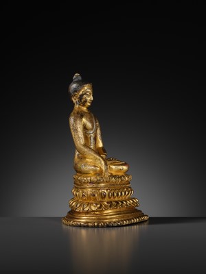 Lot 23 - A SILVER-INLAID GILT COPPER-ALLOY FIGURE OF BUDDHA SHAKYAMUNI