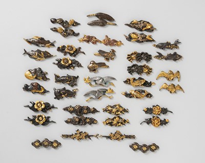 Lot 1312 - A LOT WITH TWENTY PAIRS OF MIXED-METAL MENUKI