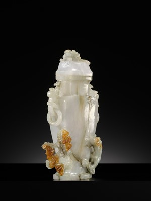 A CELADON JADEITE ‘CHILONG’ BALUSTER VASE AND COVER, LATE QING DYNASTY TO REPUBLIC PERIOD