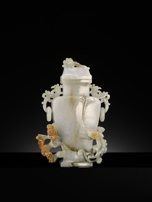 A CELADON JADEITE ‘CHILONG’ BALUSTER VASE AND COVER, LATE QING DYNASTY TO REPUBLIC PERIOD