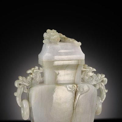 A CELADON JADEITE ‘CHILONG’ BALUSTER VASE AND COVER, LATE QING DYNASTY TO REPUBLIC PERIOD
