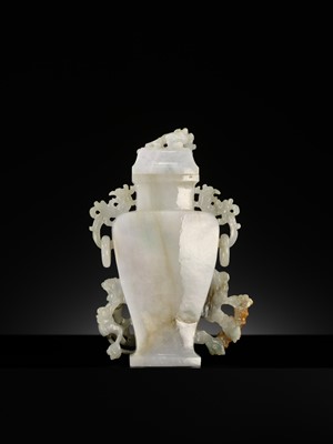 A CELADON JADEITE ‘CHILONG’ BALUSTER VASE AND COVER, LATE QING DYNASTY TO REPUBLIC PERIOD