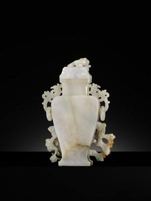 A CELADON JADEITE ‘CHILONG’ BALUSTER VASE AND COVER, LATE QING DYNASTY TO REPUBLIC PERIOD