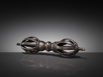 Lot 3 - A LARGE COPPER-INLAID IRON VAJRA, 12TH-15TH CENTURY