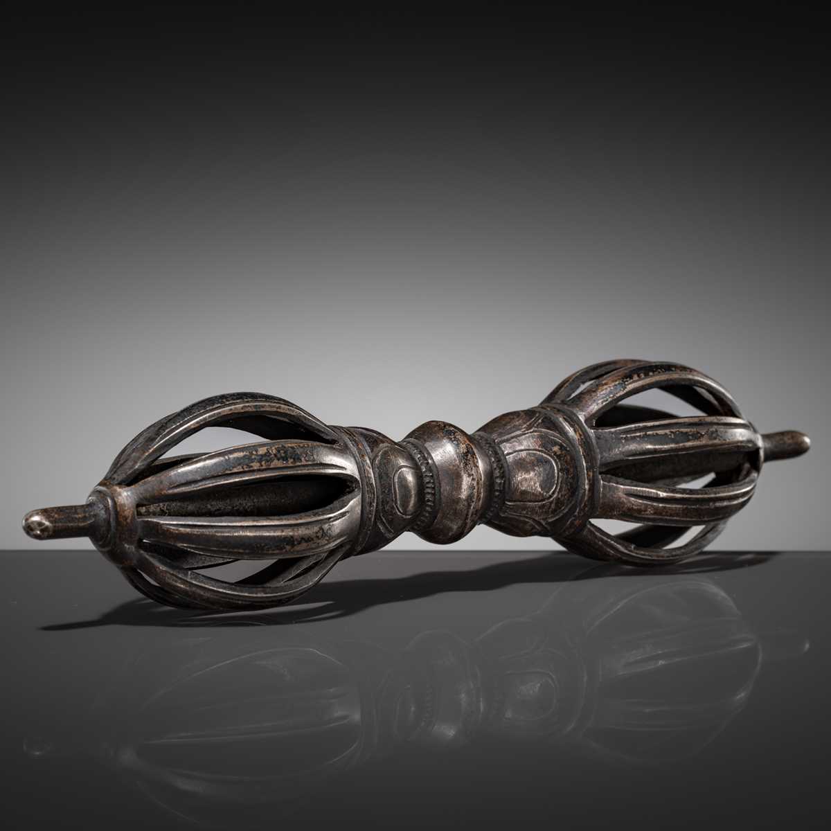 Lot 3 - A LARGE COPPER-INLAID IRON VAJRA, 12TH-15TH CENTURY