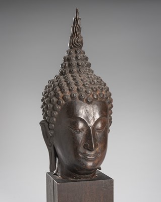 Lot 1324 - A LARGE BRONZE HEAD OF BUDDHA, SUKHOTHAI STYLE, 19TH CENTURY