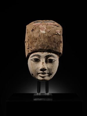 Lot 15 - AN EGYPTIAN GESSO PAINTED WOOD SARCOPHAGUS MASK, 22ND/26TH DYNASTY