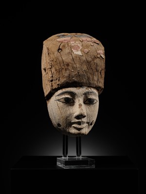 Lot 15 - AN EGYPTIAN GESSO PAINTED WOOD SARCOPHAGUS MASK, 22ND/26TH DYNASTY