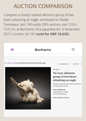 TOMOKAZU: A SUPERB IVORY OKIMONO OF AN EAGLE WITH TWO FOXES