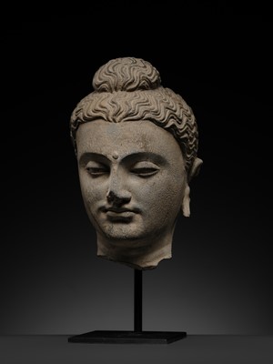 Lot 182 - A GRAY SCHIST HEAD OF BUDDHA, ANCIENT REGION OF GANDHARA, 2ND-3RD CENTURY