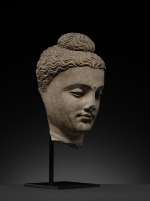 Lot 182 - A GRAY SCHIST HEAD OF BUDDHA, ANCIENT REGION OF GANDHARA, 2ND-3RD CENTURY
